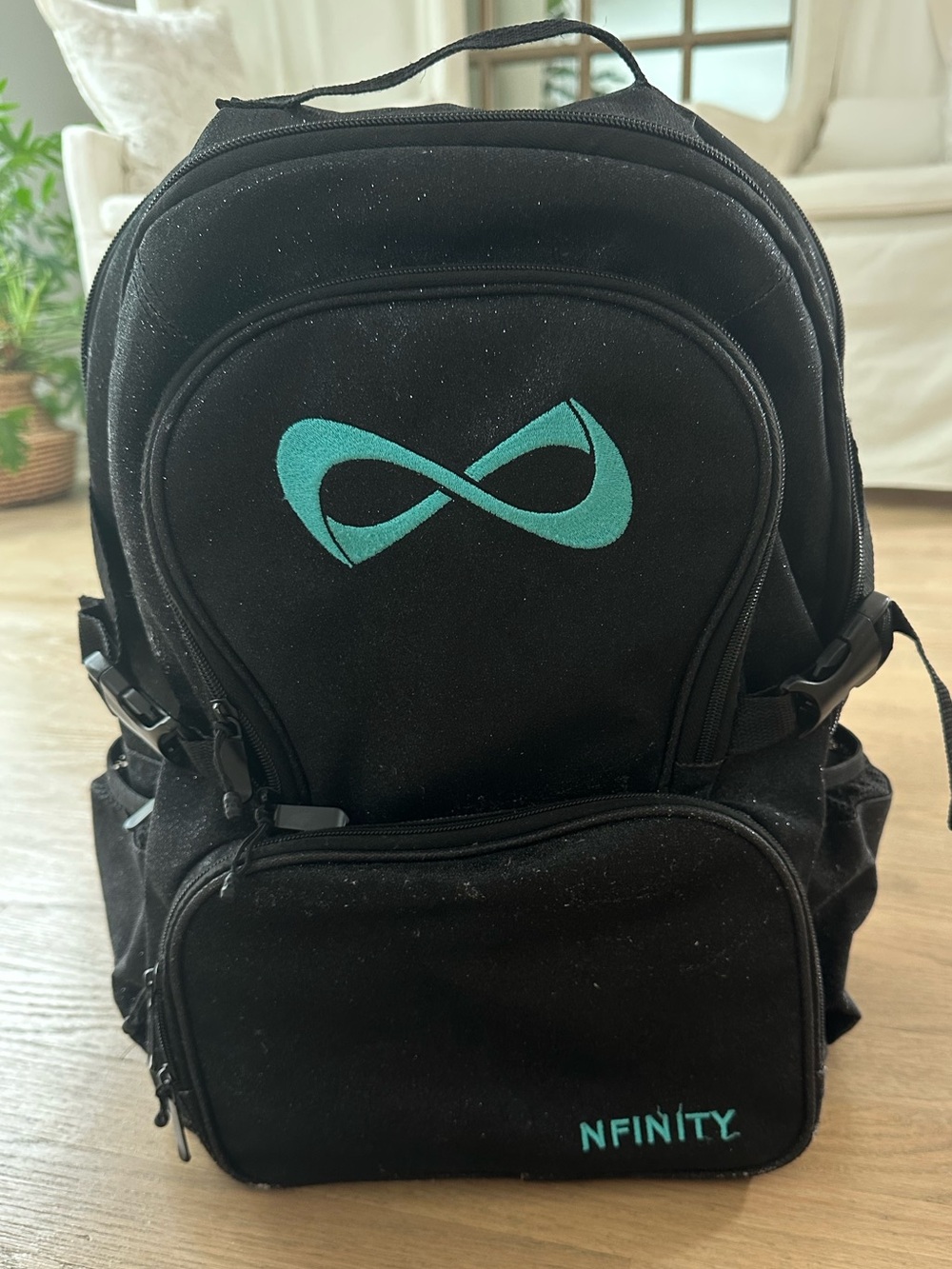 NFINITY Black Sparkle Backpack with Teal Logo